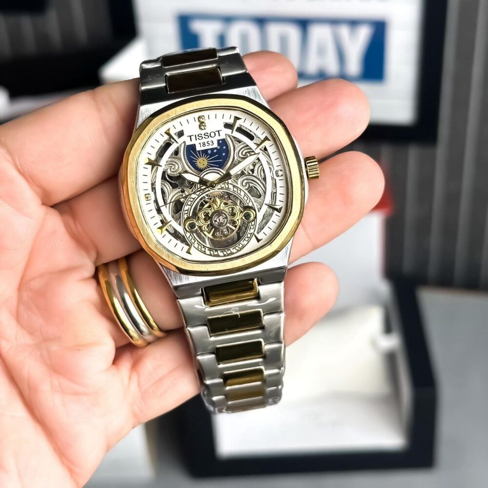 This Tissot Sun-Moon Automatic watch seems like a high-quality timepiece. Here are some key features: - Image 3