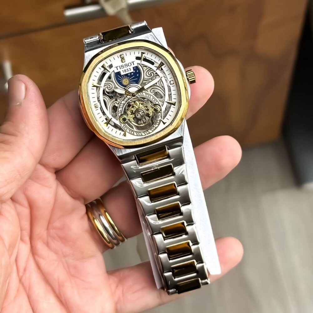This Tissot Sun-Moon Automatic watch seems like a high-quality timepiece. Here are some key features: - Image 2